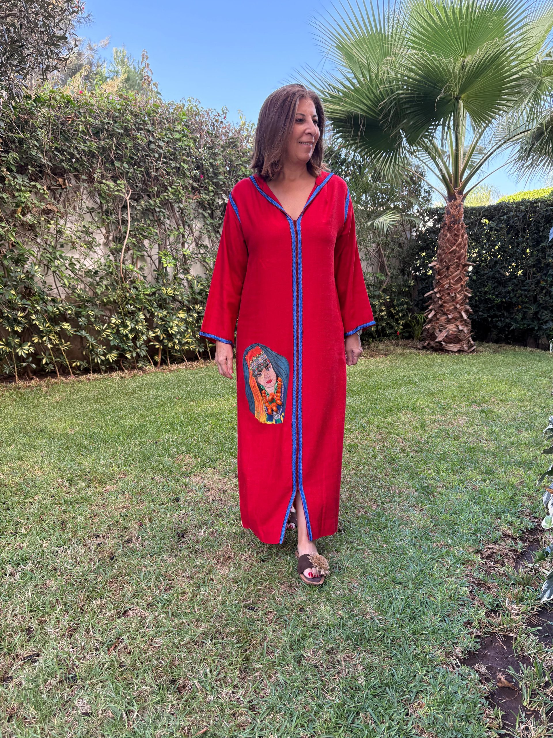 Moroccan jellaba adorned with hand-painted artistry. Moroccan jellaba adorned with hand-painted artistry - Image 1